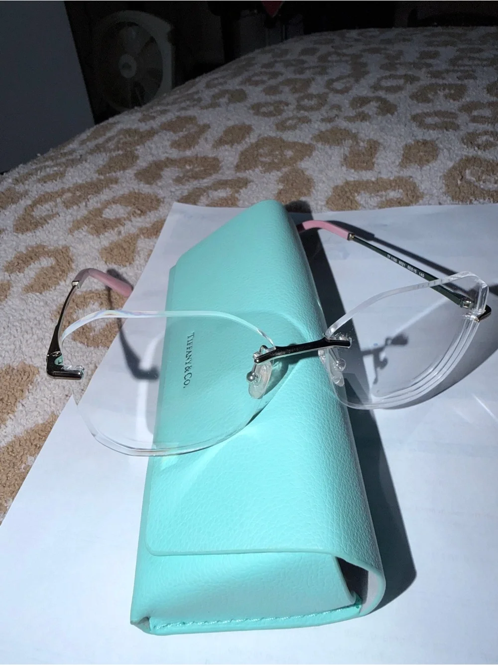 Tiffany & Co. Rimless Glasses with Pink Temples and Gold Accents